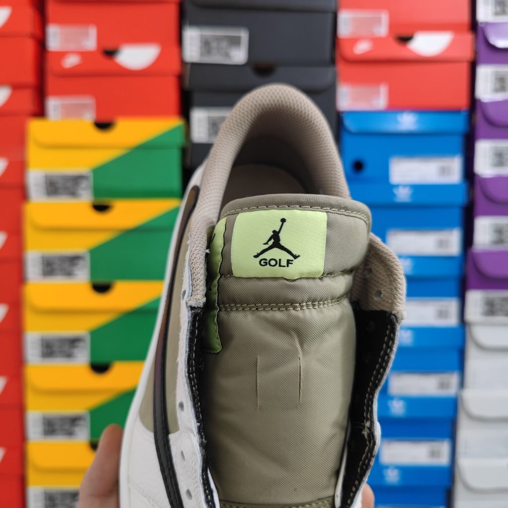 Shop Travis Scott x Air Jordan 1 Low Golf FZ3124-200 Neutral Olive with reverse Swoosh, Cactus Jack branding, Nike Air cushioning and golf traction.