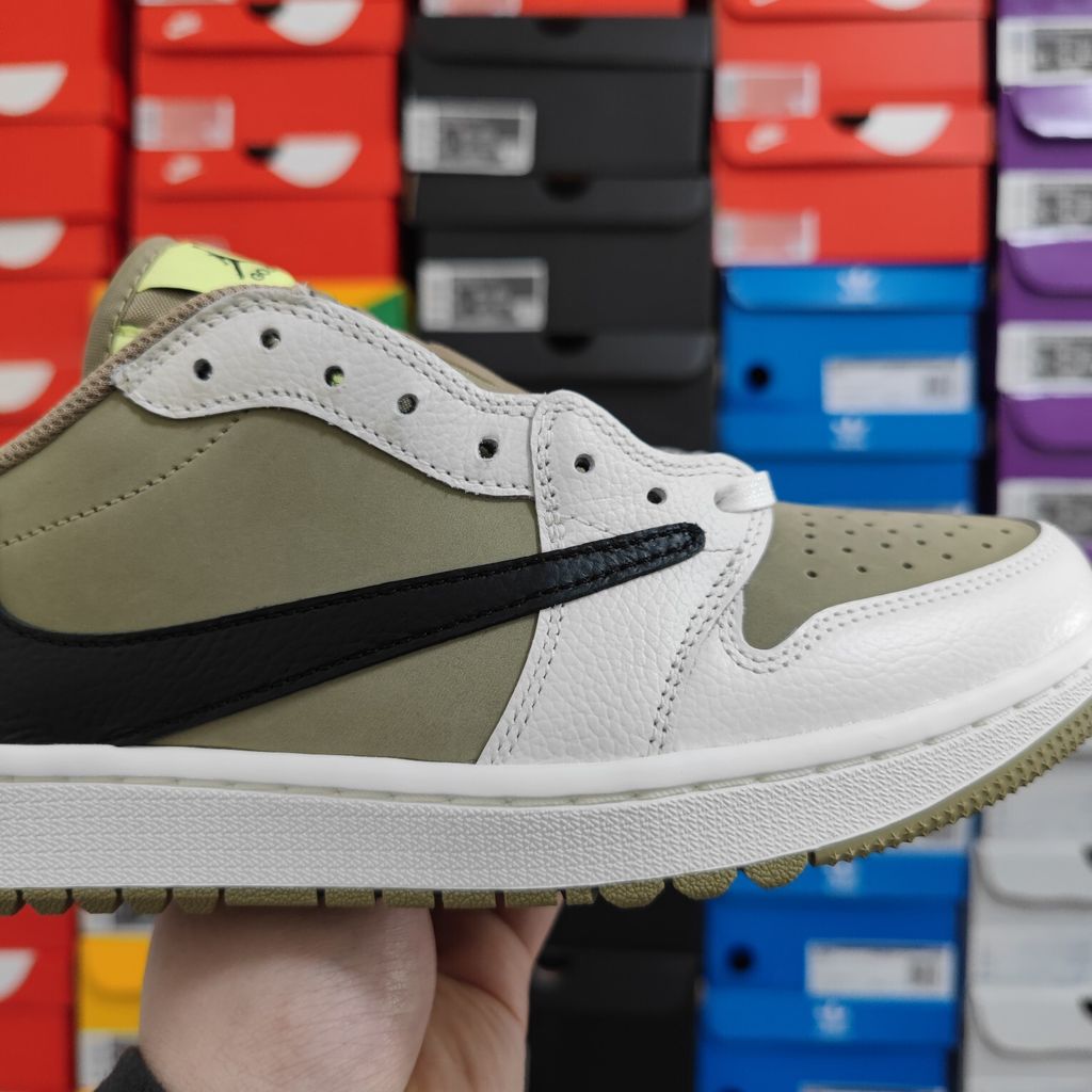 Shop Travis Scott x Air Jordan 1 Low Golf FZ3124-200 Neutral Olive with reverse Swoosh, Cactus Jack branding, Nike Air cushioning and golf traction.