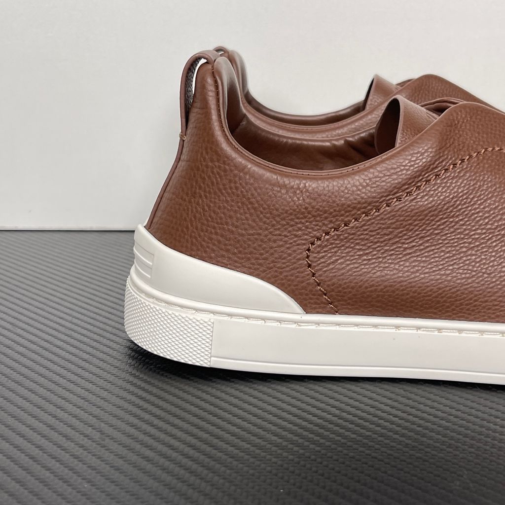Shop ZEGNA Triple Stitch SECONDSKIN LHOTA-S5207Z-ALM in Almond Brown with soft calf leather, triple-cross elastics, removable footbed and white rubber sole.