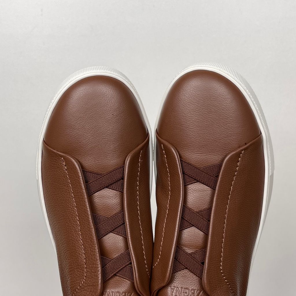 Shop ZEGNA Triple Stitch SECONDSKIN LHOTA-S5207Z-ALM in Almond Brown with soft calf leather, triple-cross elastics, removable footbed and white rubber sole.