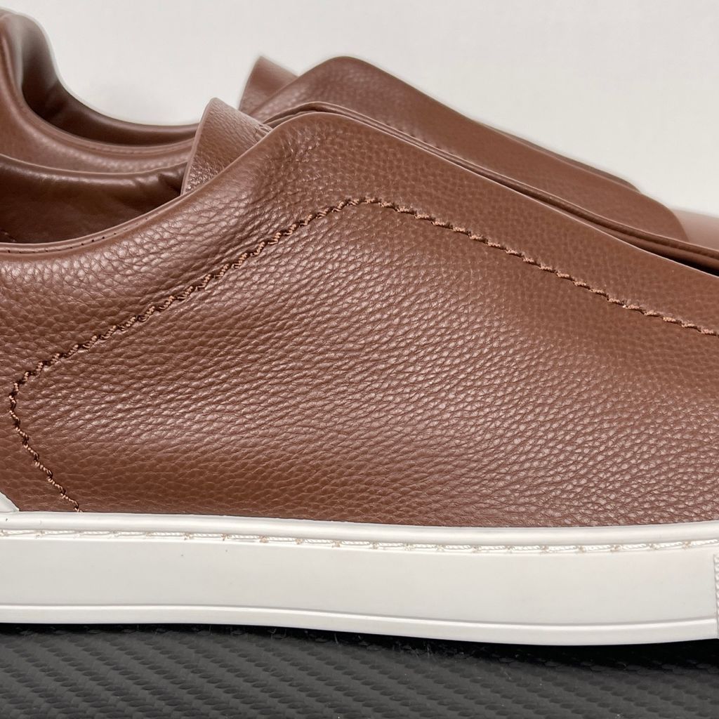 Shop ZEGNA Triple Stitch SECONDSKIN LHOTA-S5207Z-ALM in Almond Brown with soft calf leather, triple-cross elastics, removable footbed and white rubber sole.
