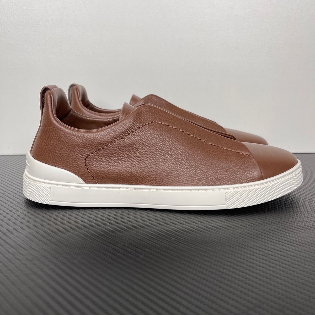 Shop ZEGNA Triple Stitch SECONDSKIN LHOTA-S5207Z-ALM in Almond Brown with soft calf leather, triple-cross elastics, removable footbed and white rubber sole.