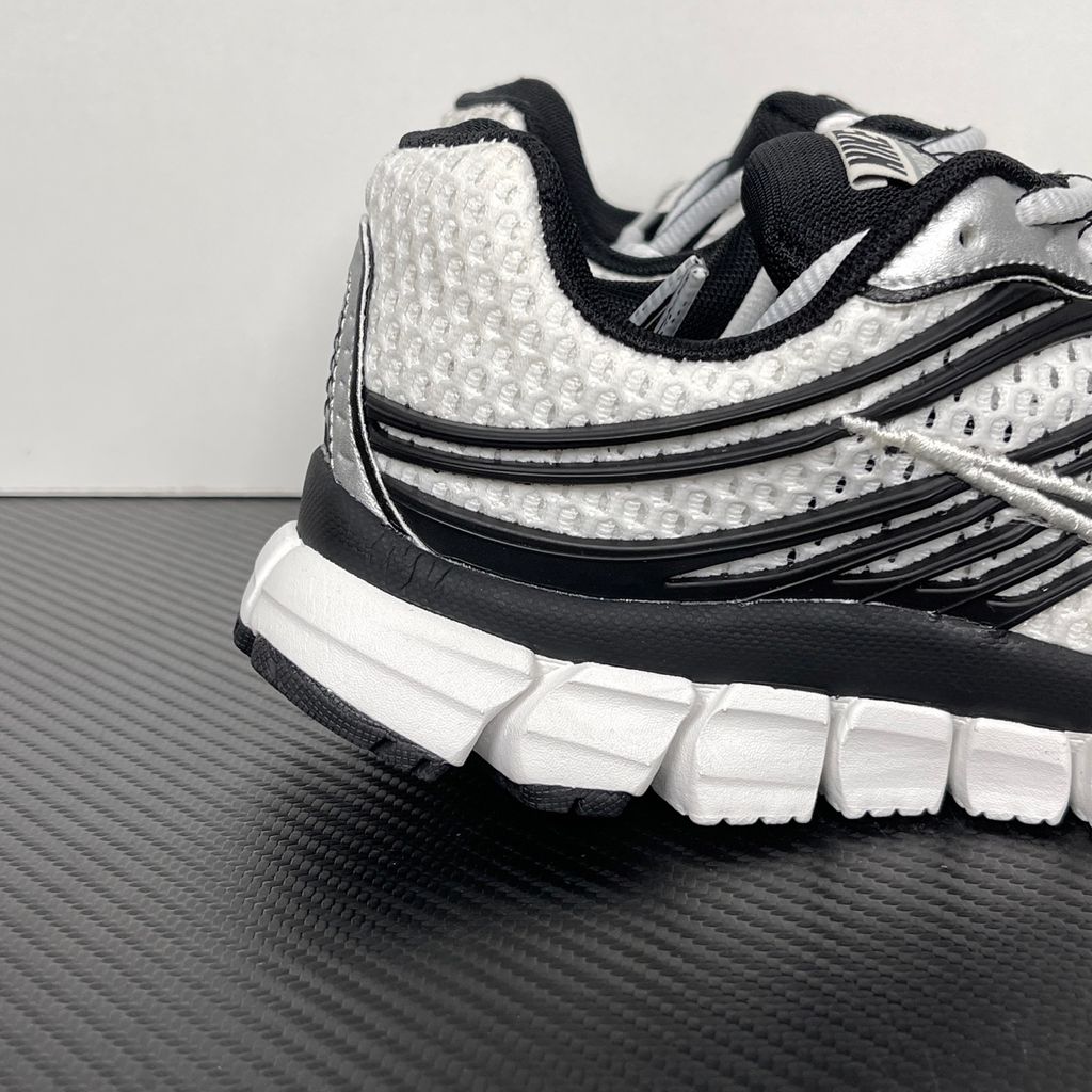 Shop Nike Zoom Skylon 11 IU1869-101 in Summit White, Black, Light Smoke Grey and Metallic Silver with heel Air Zoom, Cushlon cushioning and flexible traction.