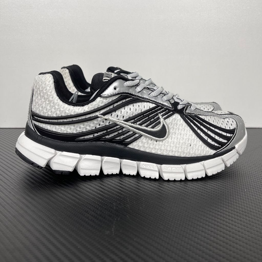 Shop Nike Zoom Skylon 11 IU1869-101 in Summit White, Black, Light Smoke Grey and Metallic Silver with heel Air Zoom, Cushlon cushioning and flexible traction.