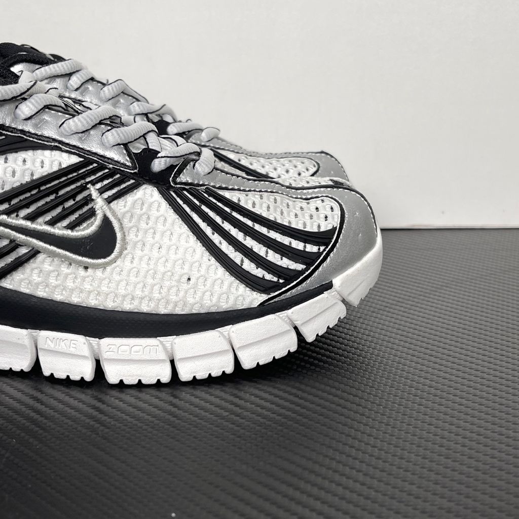 Shop Nike Zoom Skylon 11 IU1869-101 in Summit White, Black, Light Smoke Grey and Metallic Silver with heel Air Zoom, Cushlon cushioning and flexible traction.