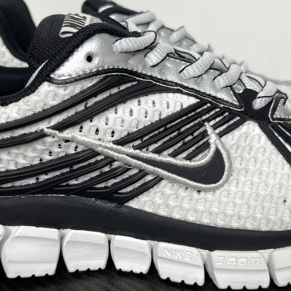 Shop Nike Zoom Skylon 11 IU1869-101 in Summit White, Black, Light Smoke Grey and Metallic Silver with heel Air Zoom, Cushlon cushioning and flexible traction.