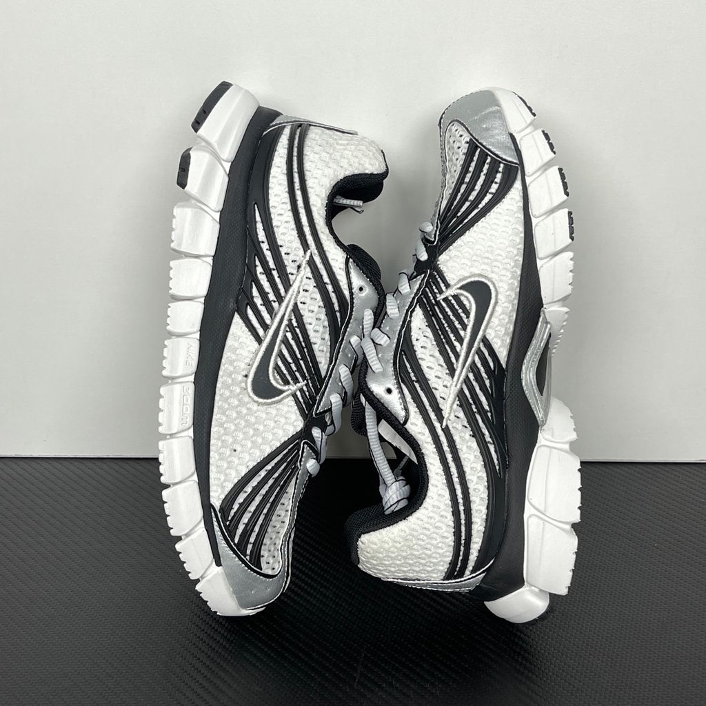 Shop Nike Zoom Skylon 11 IU1869-101 in Summit White, Black, Light Smoke Grey and Metallic Silver with heel Air Zoom, Cushlon cushioning and flexible traction.