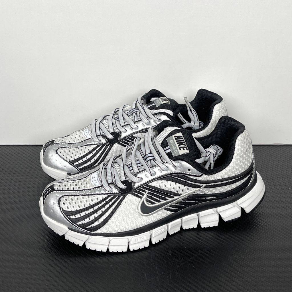 Shop Nike Zoom Skylon 11 IU1869-101 in Summit White, Black, Light Smoke Grey and Metallic Silver with heel Air Zoom, Cushlon cushioning and flexible traction.
