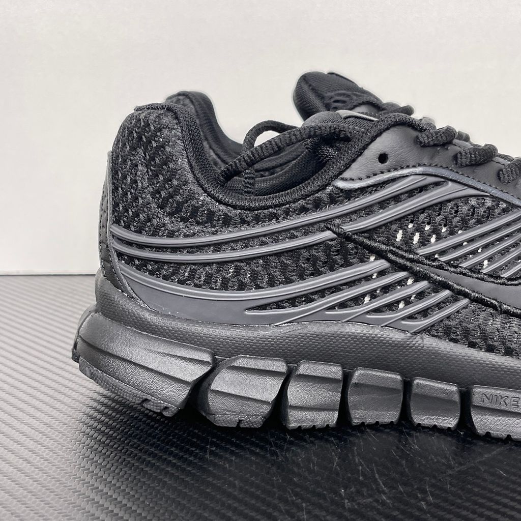 Shop Nike Zoom Skylon 11 IU7360-002 in Black and Anthracite with breathable mesh, Air Zoom cushioning, Cushlon foam and retro Y2K running style.
