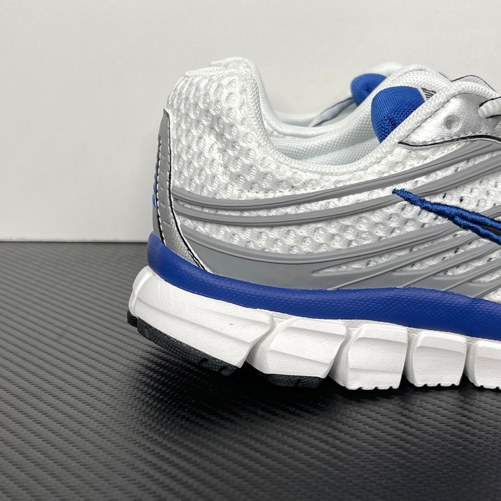 Shop Nike Zoom Skylon 11 IU1869-103 in White, Metallic Silver, Old Royal and Black with heel Air Zoom, Cushlon cushioning and flexible Y2K styling.