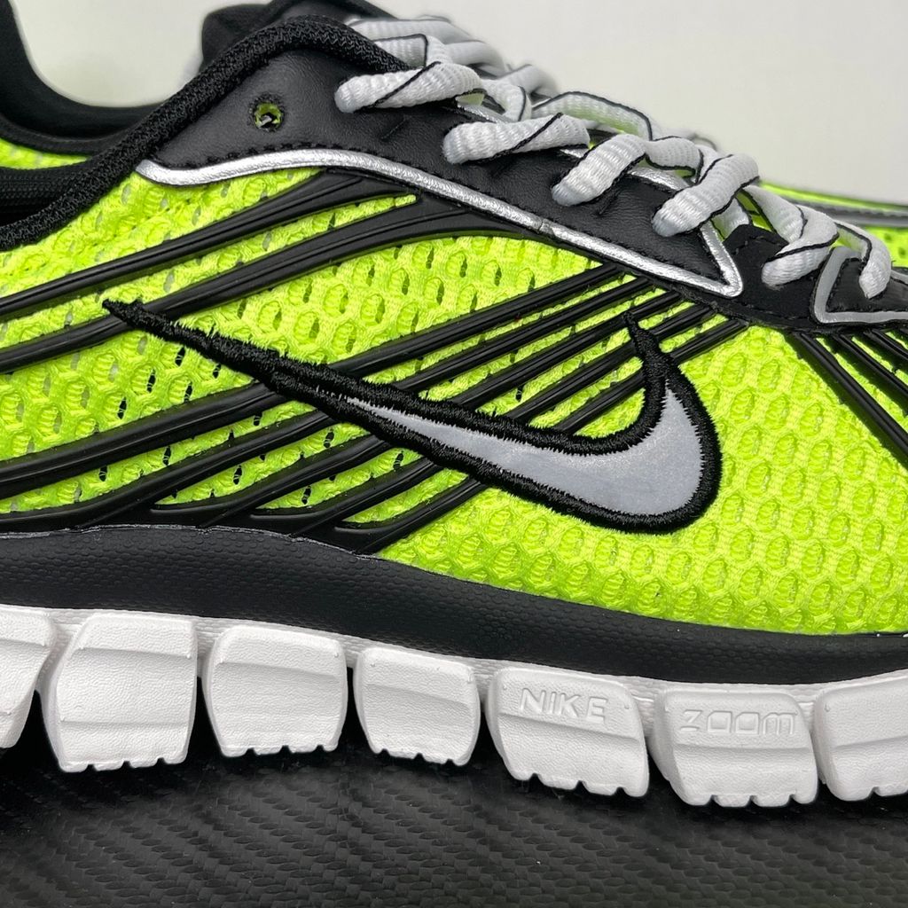 Shop Nike Zoom Skylon 11 IU1869-700 in Volt, Black, Light Smoke Grey and Metallic Silver with Air Zoom cushioning, breathable mesh and flexible foam tooling.