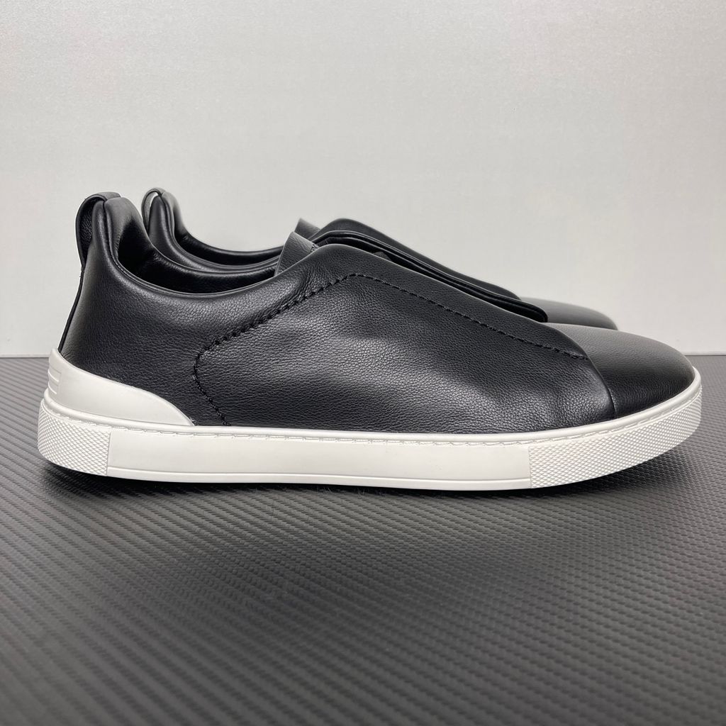 Shop ZEGNA Triple Stitch SECONDSKIN LHOTA-S5207Z-NER in Nero Oasi Black with soft calf leather, triple-cross elastics, removable footbed and white rubber sole.