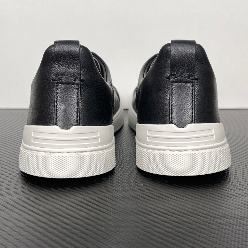 Shop ZEGNA Triple Stitch SECONDSKIN LHOTA-S5207Z-NER in Nero Oasi Black with soft calf leather, triple-cross elastics, removable footbed and white rubber sole.