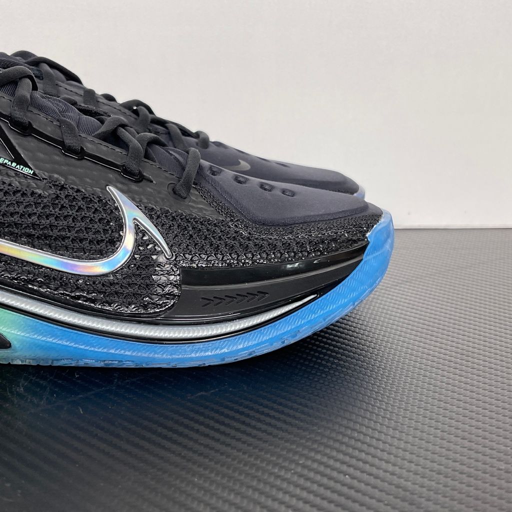 Shop Nike Air Zoom G.T. Cut 1 EP Nike Nationals IX5225-001 in Black, Radiant Green and Radiant Blue with React, Air Zoom Strobel and heel Zoom cushioning.