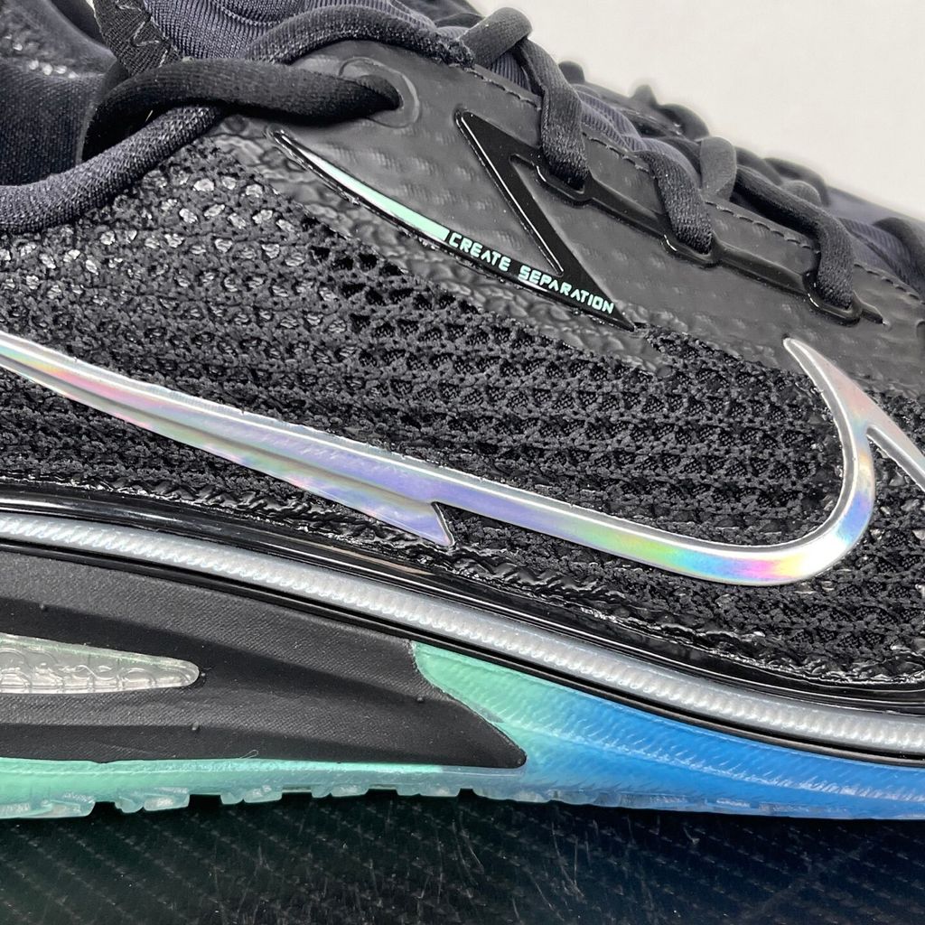 Shop Nike Air Zoom G.T. Cut 1 EP Nike Nationals IX5225-001 in Black, Radiant Green and Radiant Blue with React, Air Zoom Strobel and heel Zoom cushioning.