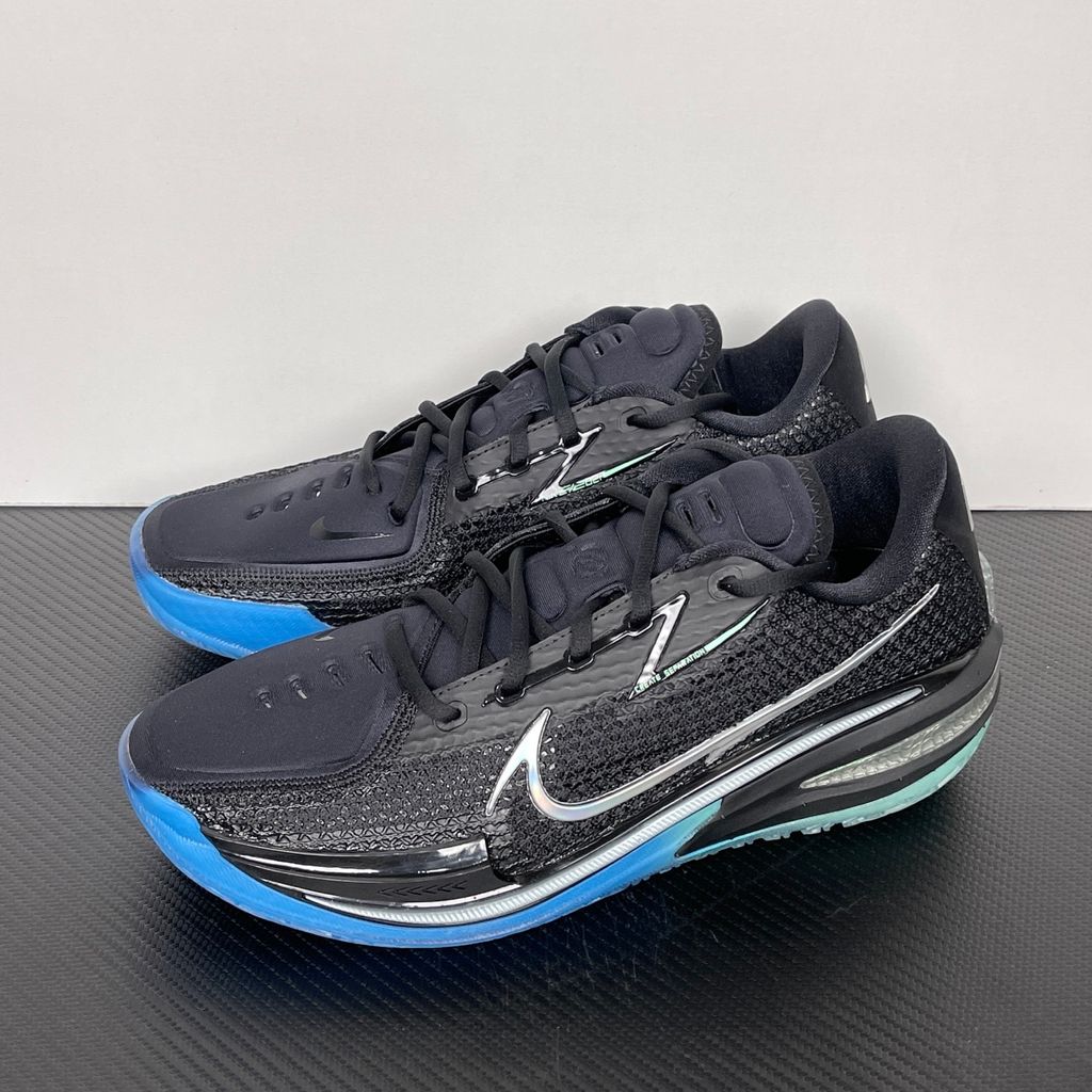 Shop Nike Air Zoom G.T. Cut 1 EP Nike Nationals IX5225-001 in Black, Radiant Green and Radiant Blue with React, Air Zoom Strobel and heel Zoom cushioning.