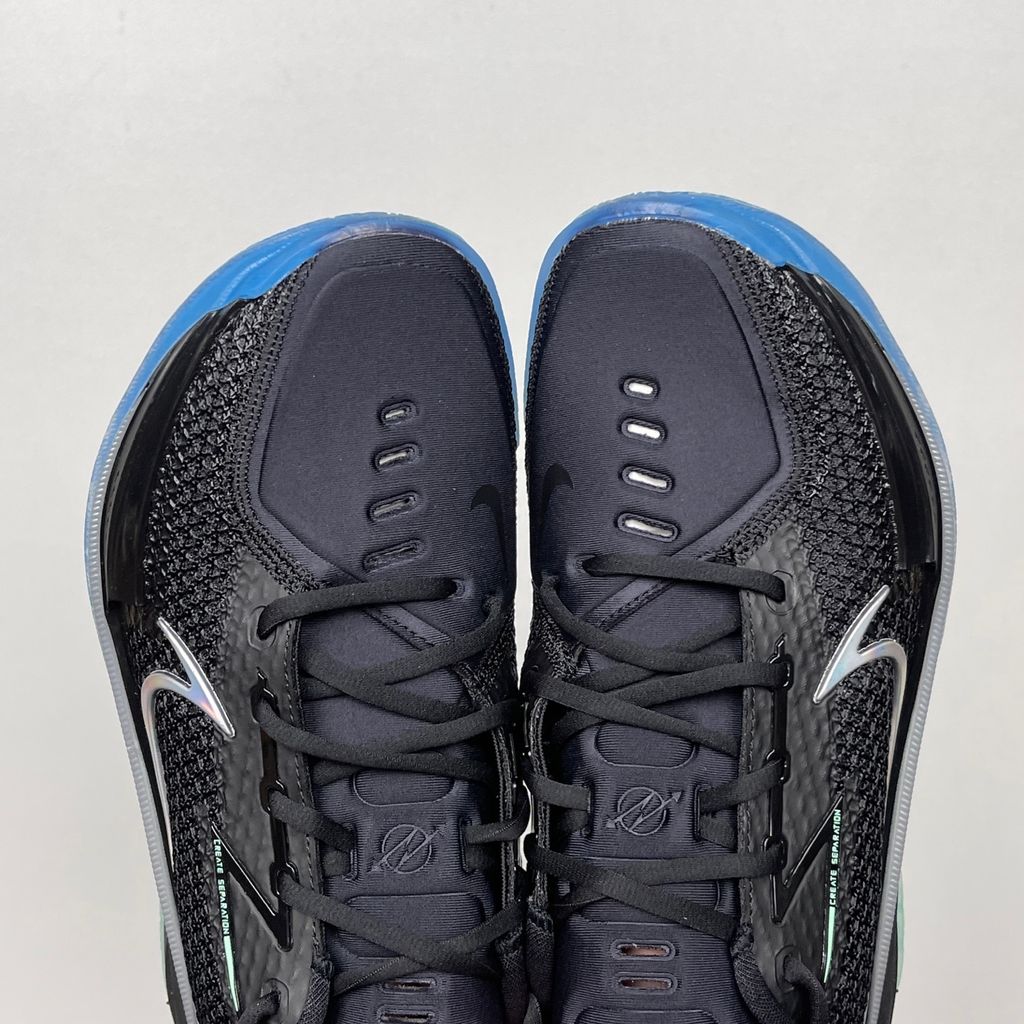 Shop Nike Air Zoom G.T. Cut 1 EP Nike Nationals IX5225-001 in Black, Radiant Green and Radiant Blue with React, Air Zoom Strobel and heel Zoom cushioning.