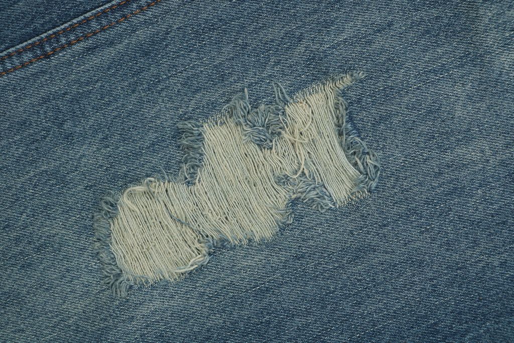 1. Louis Vuitton Frayed Relaxed Washed Denim Jeans