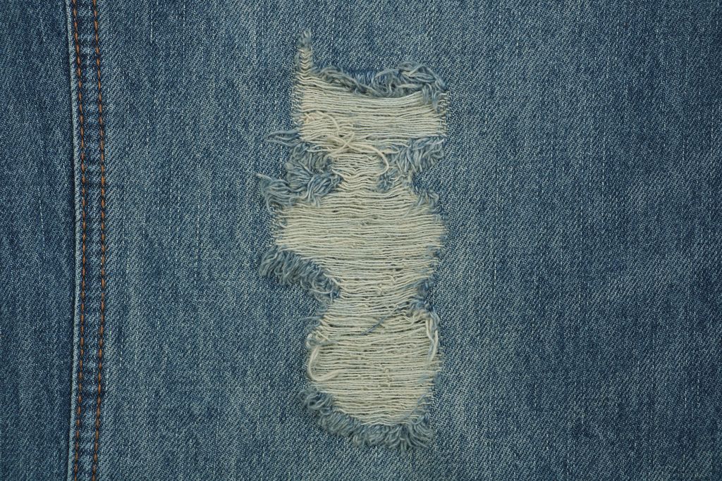1. Louis Vuitton Frayed Relaxed Washed Denim Jeans