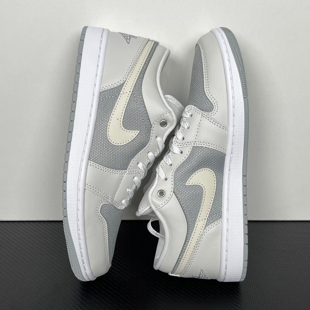 Shop Air Jordan 1 Low SE IO2049-100 in Off-White, Soft Pearl and Light Smoke Grey with genuine leather, Air-Sole cushioning and solid rubber traction.