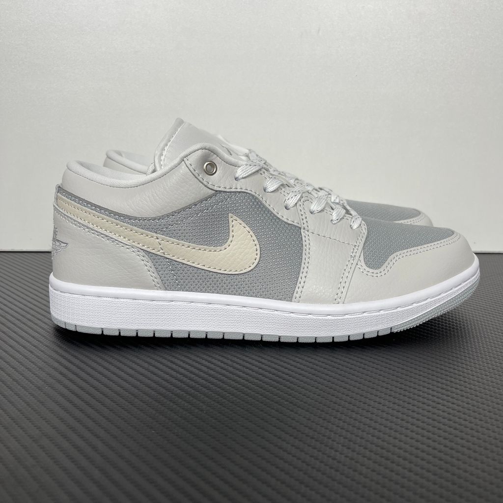 Shop Air Jordan 1 Low SE IO2049-100 in Off-White, Soft Pearl and Light Smoke Grey with genuine leather, Air-Sole cushioning and solid rubber traction.