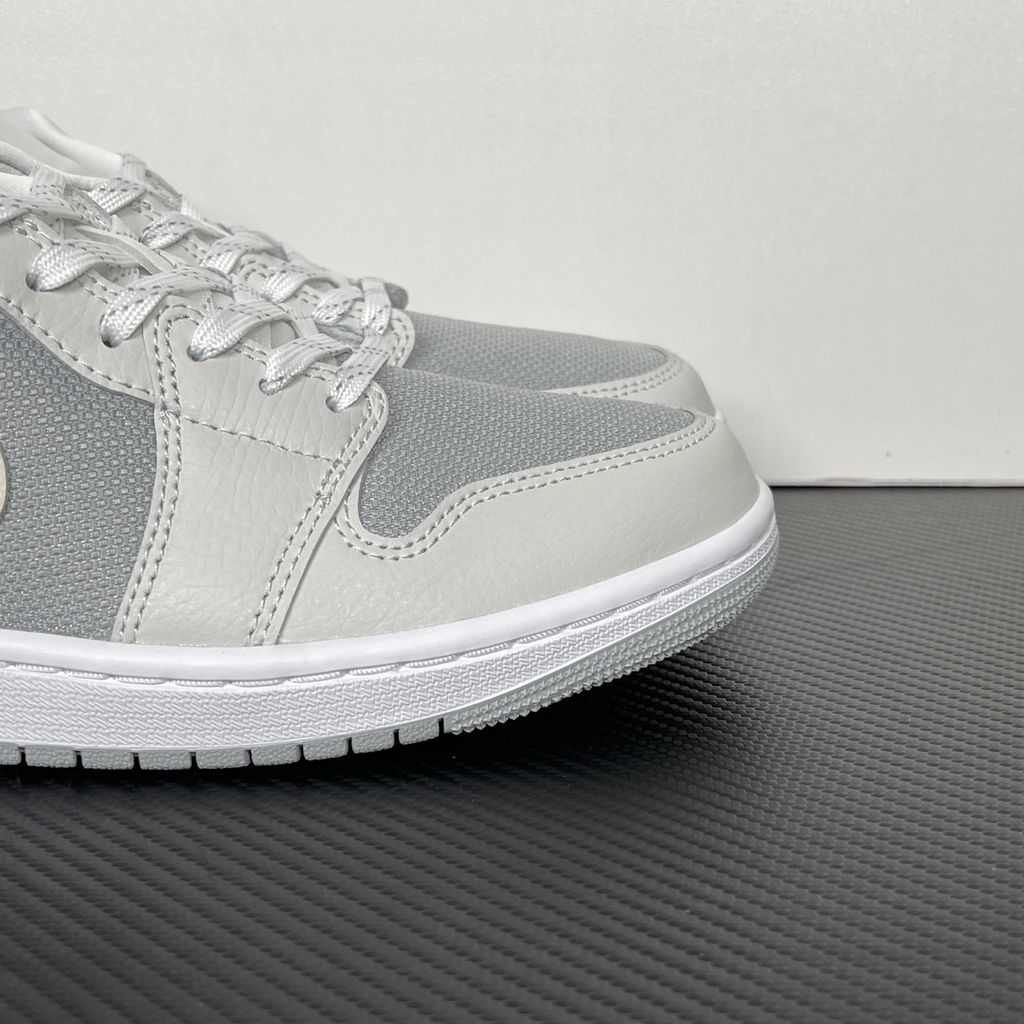 Shop Air Jordan 1 Low SE IO2049-100 in Off-White, Soft Pearl and Light Smoke Grey with genuine leather, Air-Sole cushioning and solid rubber traction.