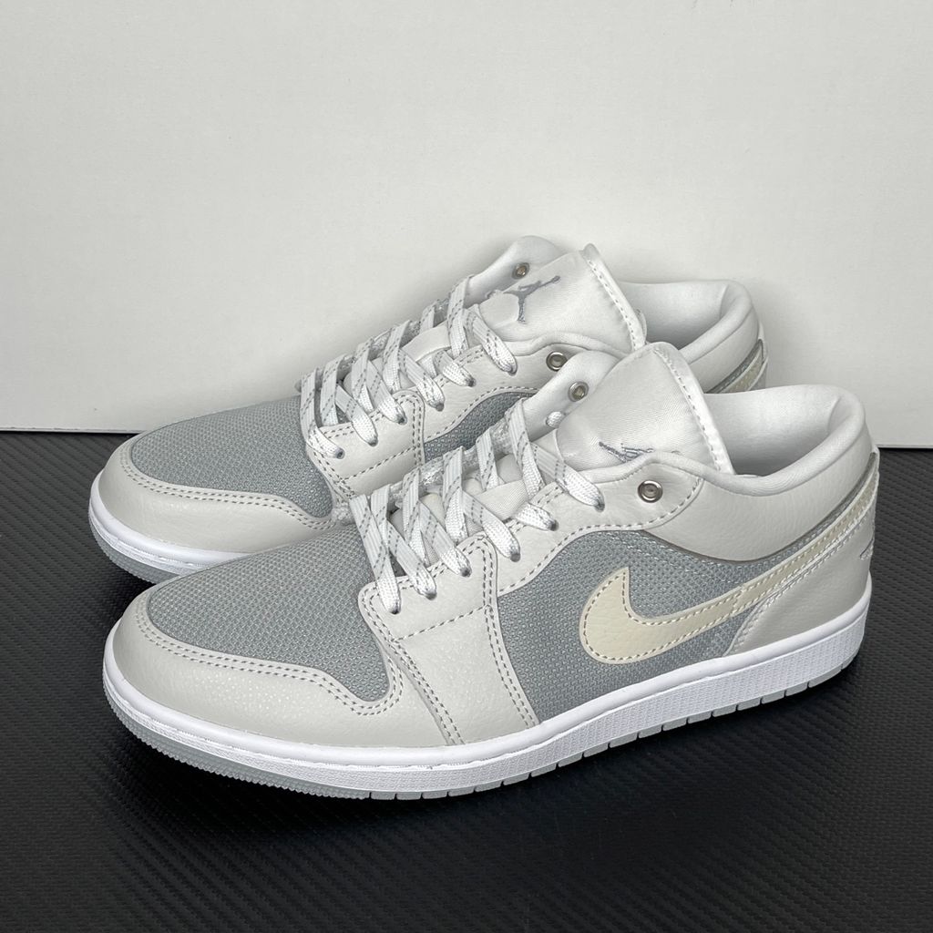 Shop Air Jordan 1 Low SE IO2049-100 in Off-White, Soft Pearl and Light Smoke Grey with genuine leather, Air-Sole cushioning and solid rubber traction.