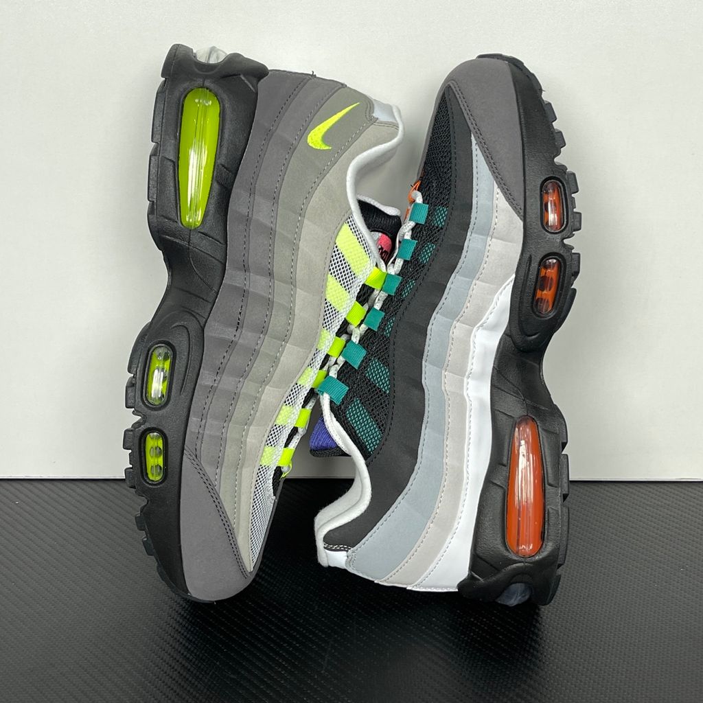 Shop Nike Air Max 95 Big Bubble Premium Greedy IM2211-001 with Neon, Grape, Solar Red and Bright Mandarin accents, visible Max Air cushioning and layered upper.