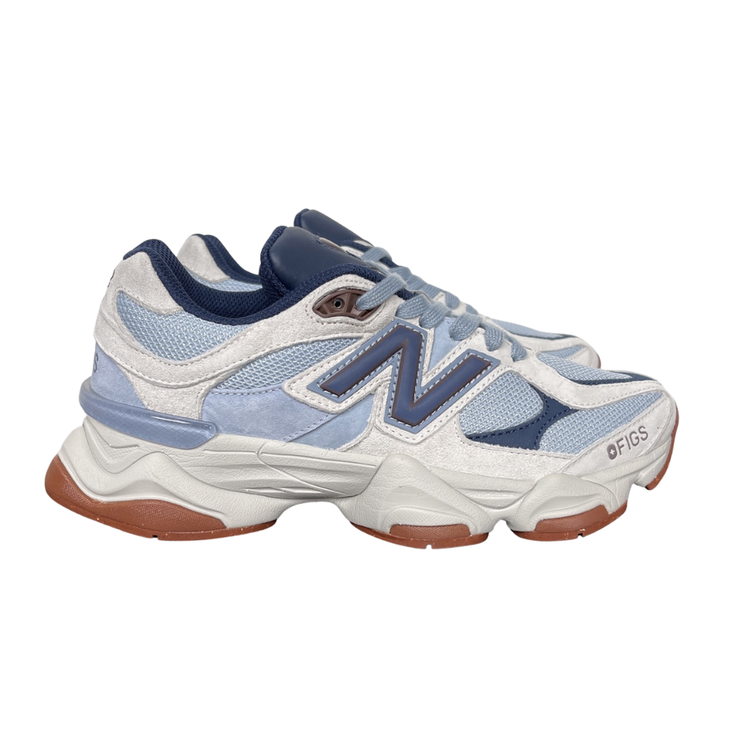 Shop New Balance 9060 U90601T1 in Blue Grey, Cream and Gum with layered mesh and suede styling, ABZORB and SBS cushioning and sculpted Y2K design.