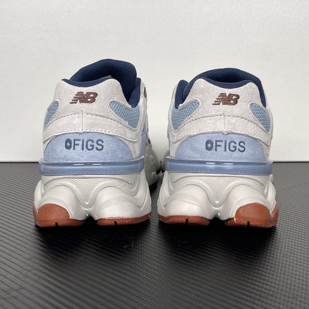 Shop New Balance 9060 U90601T1 in Blue Grey, Cream and Gum with layered mesh and suede styling, ABZORB and SBS cushioning and sculpted Y2K design.