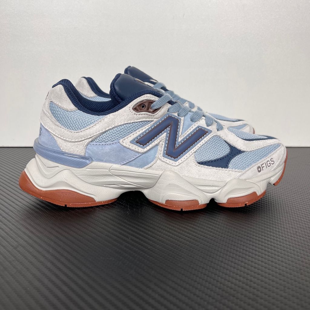 Shop New Balance 9060 U90601T1 in Blue Grey, Cream and Gum with layered mesh and suede styling, ABZORB and SBS cushioning and sculpted Y2K design.