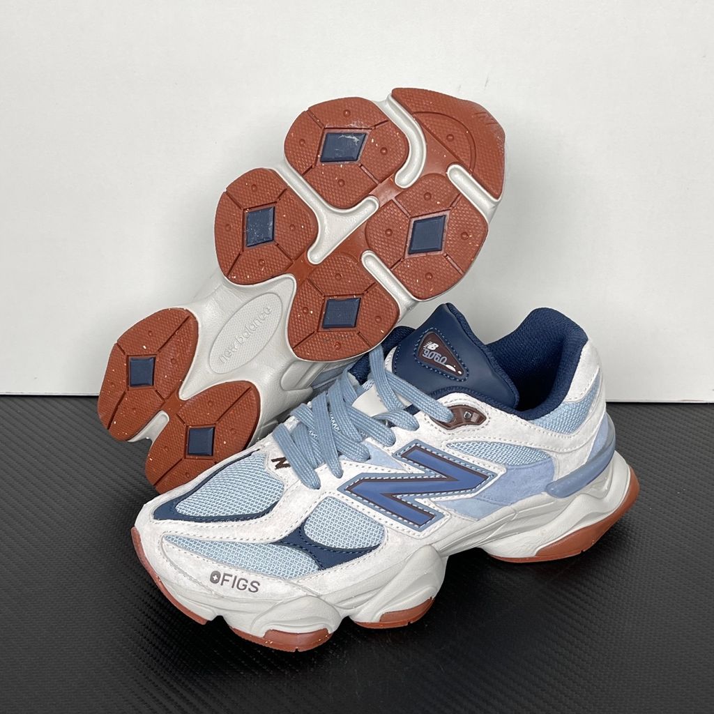 Shop New Balance 9060 U90601T1 in Blue Grey, Cream and Gum with layered mesh and suede styling, ABZORB and SBS cushioning and sculpted Y2K design.