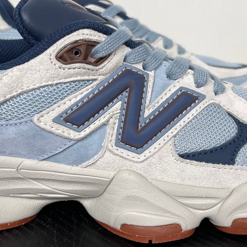 Shop New Balance 9060 U90601T1 in Blue Grey, Cream and Gum with layered mesh and suede styling, ABZORB and SBS cushioning and sculpted Y2K design.