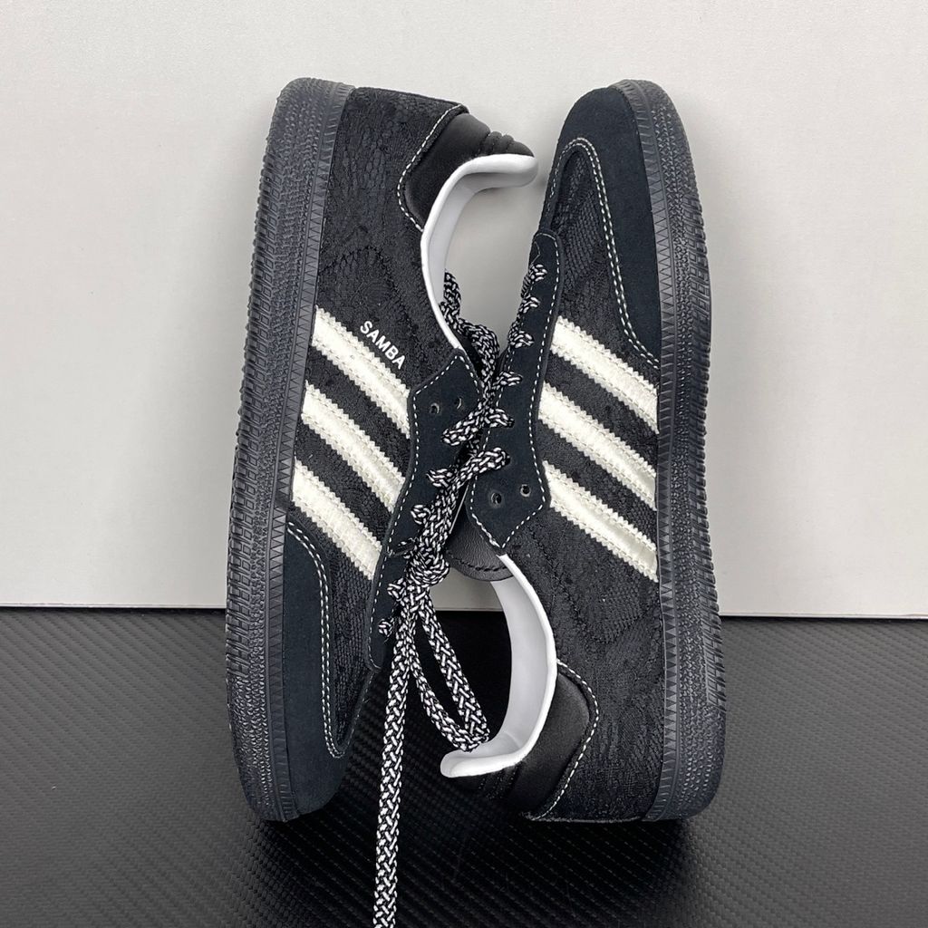 Shop adidas Samba OG W KH7842 in Core Black, Cloud White and Grey One with lace-inspired detailing, contrast stitching and classic low-profile Samba styling.