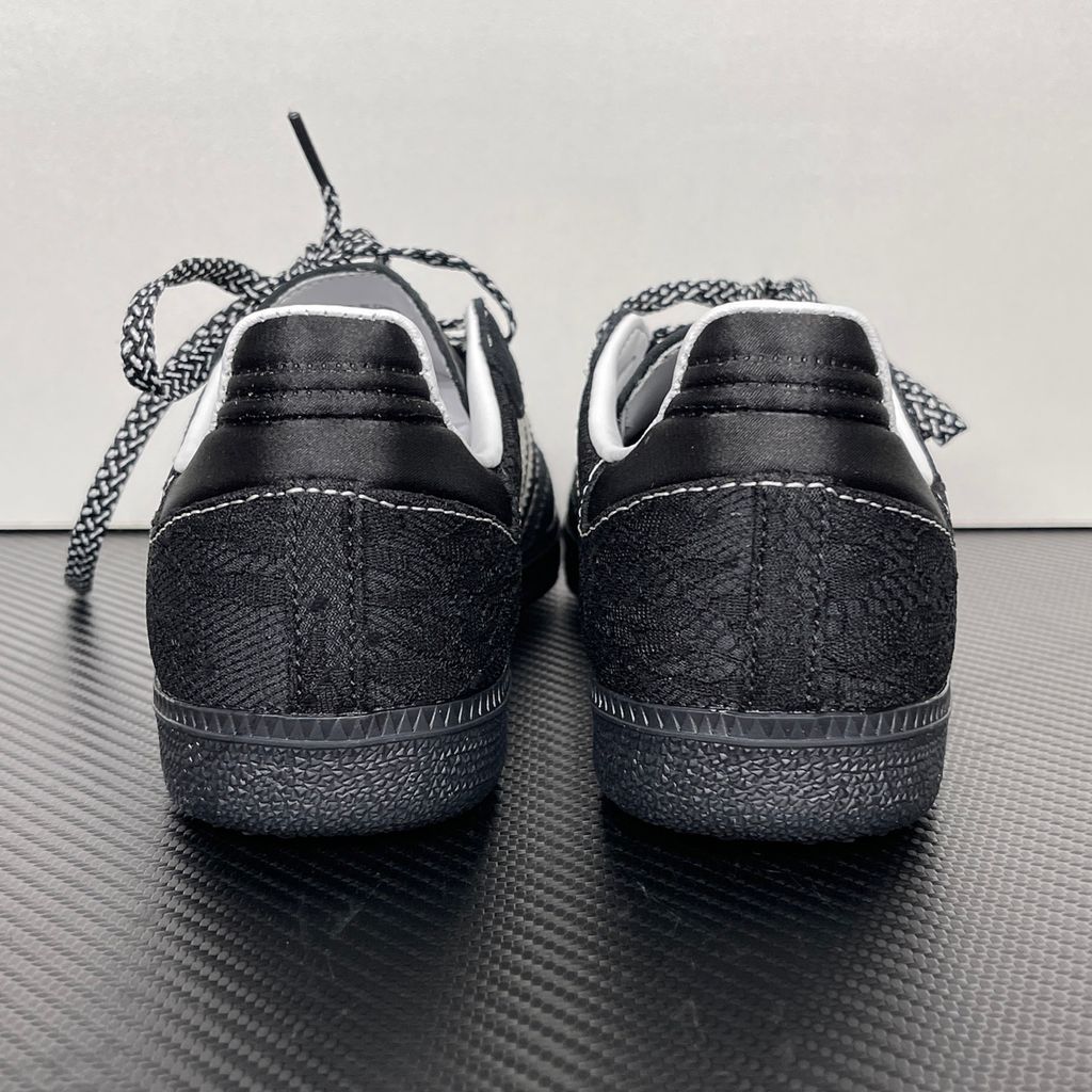 Shop adidas Samba OG W KH7842 in Core Black, Cloud White and Grey One with lace-inspired detailing, contrast stitching and classic low-profile Samba styling.