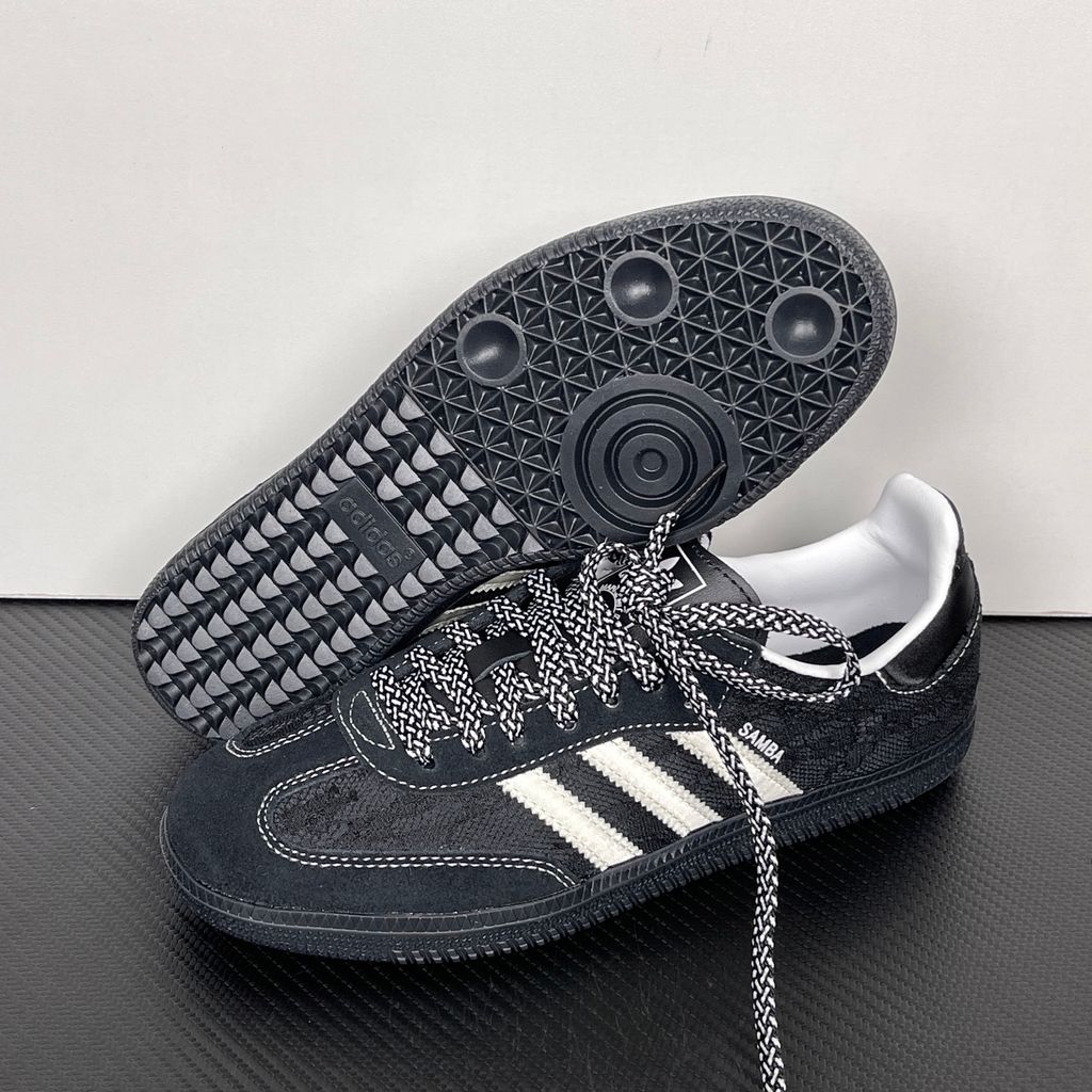 Shop adidas Samba OG W KH7842 in Core Black, Cloud White and Grey One with lace-inspired detailing, contrast stitching and classic low-profile Samba styling.