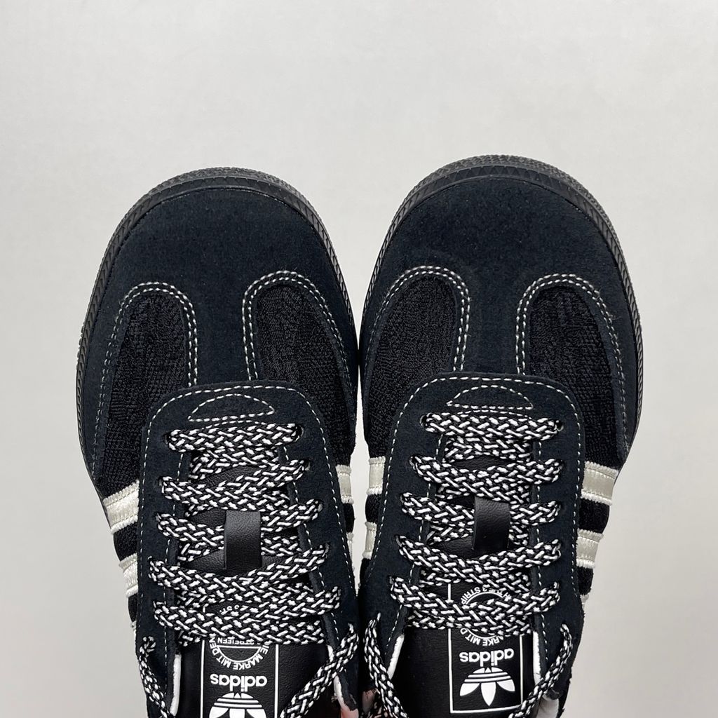 Shop adidas Samba OG W KH7842 in Core Black, Cloud White and Grey One with lace-inspired detailing, contrast stitching and classic low-profile Samba styling.