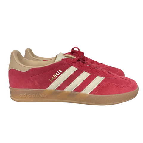 Shop adidas Gazelle Indoor KI2251 in Team Victory Red, Warm Vanilla and Magic Beige with leather upper, classic 3-Stripes, gold Gazelle branding and rubber outsole.