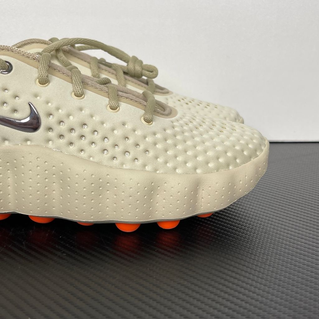 Shop Nike Mind 002 HQ4308-200 in Light Khaki and Desert Khaki with 22 sensory nodes, breathable knit upper, soft foam cushioning and rubber traction pods.