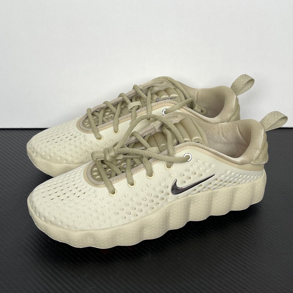 Shop Nike Mind 002 HQ4308-200 in Light Khaki and Desert Khaki with 22 sensory nodes, breathable knit upper, soft foam cushioning and rubber traction pods.