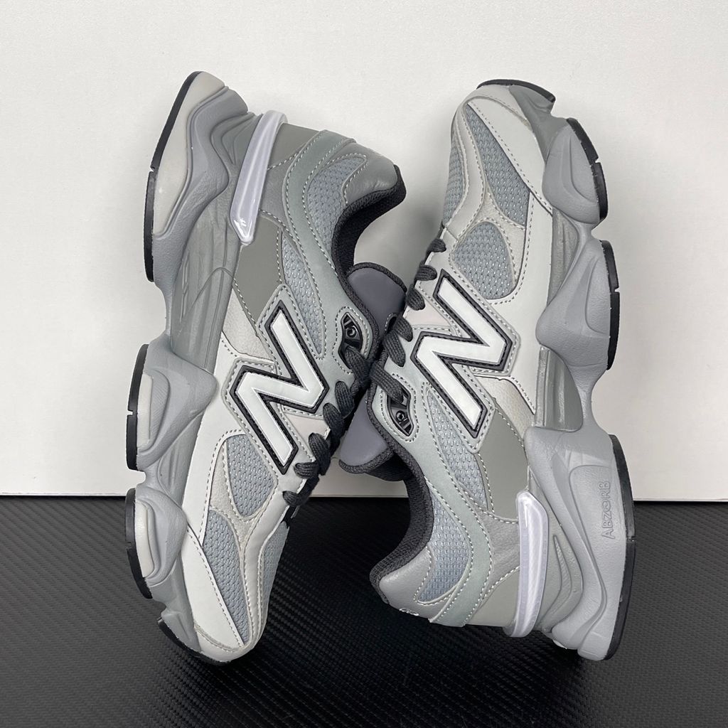 Shop New Balance 9060 U90609XS in Slate Grey and Harbor Grey with mesh and suede upper, ABZORB and SBS cushioning, CR heel device and sculpted Y2K styling.