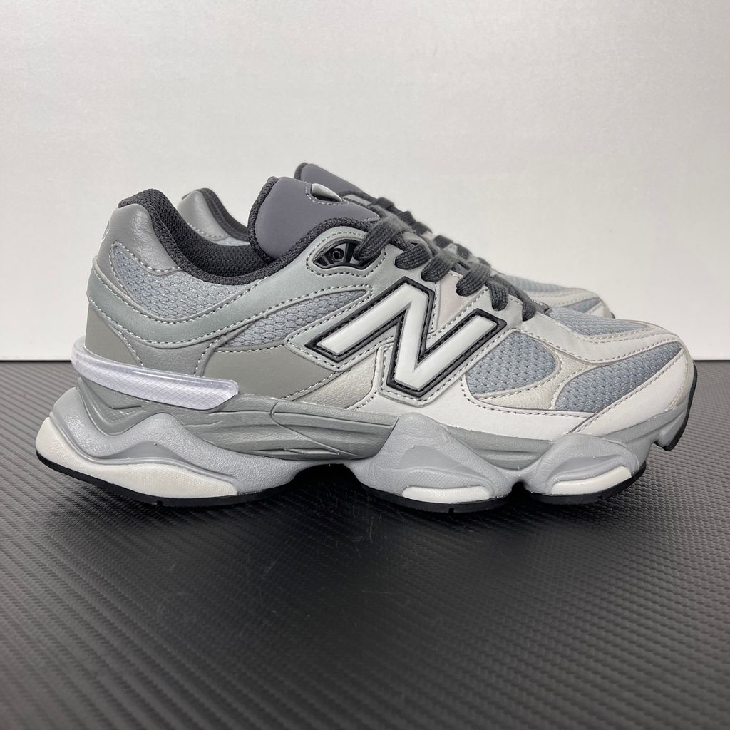 Shop New Balance 9060 U90609XS in Slate Grey and Harbor Grey with mesh and suede upper, ABZORB and SBS cushioning, CR heel device and sculpted Y2K styling.