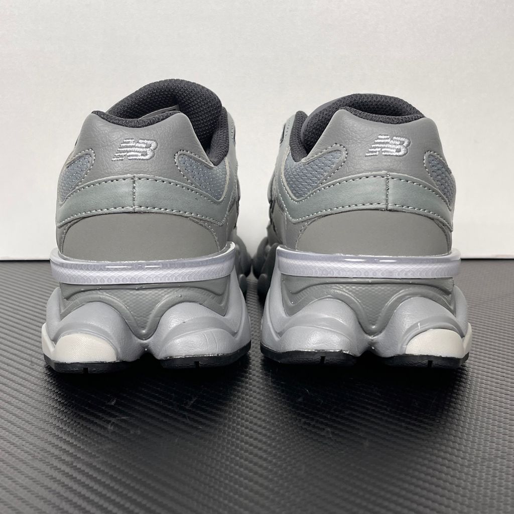 Shop New Balance 9060 U90609XS in Slate Grey and Harbor Grey with mesh and suede upper, ABZORB and SBS cushioning, CR heel device and sculpted Y2K styling.