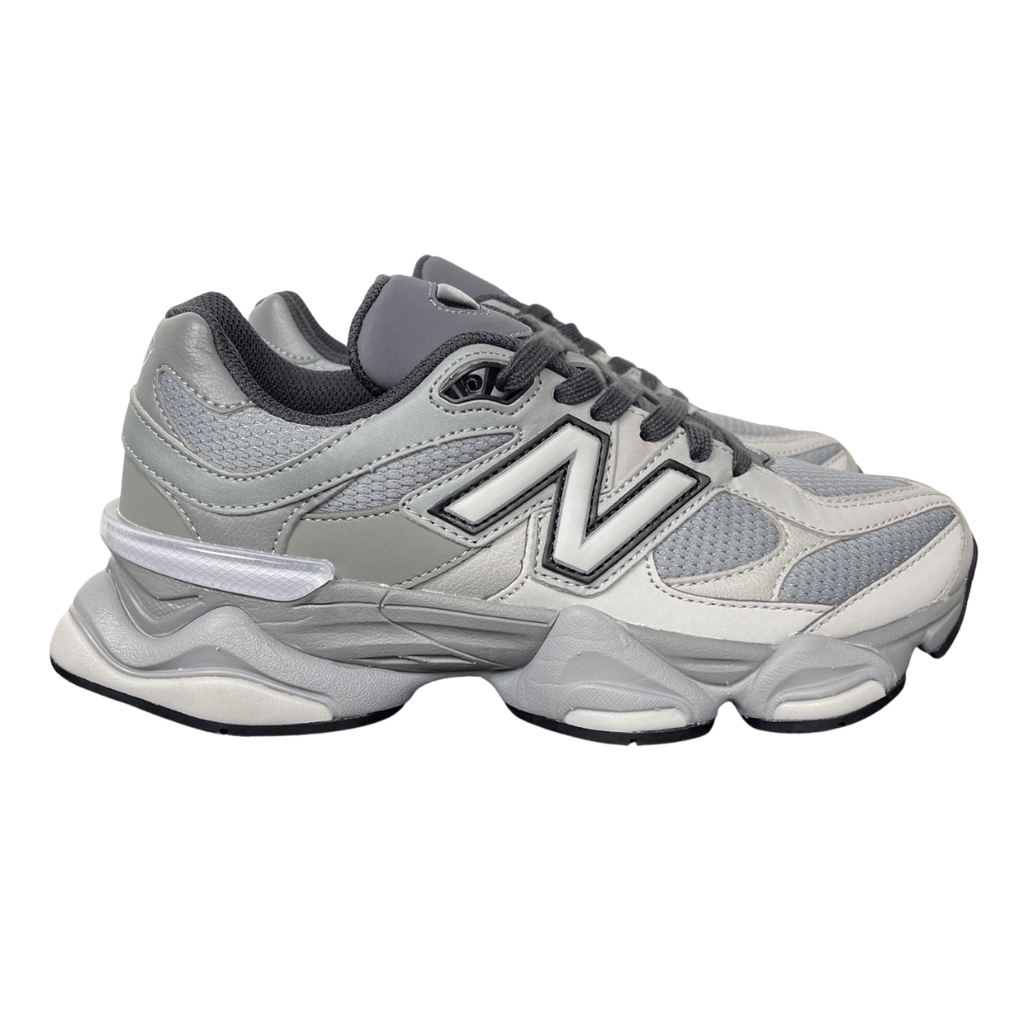 Shop New Balance 9060 U90609XS in Slate Grey and Harbor Grey with mesh and suede upper, ABZORB and SBS cushioning, CR heel device and sculpted Y2K styling.