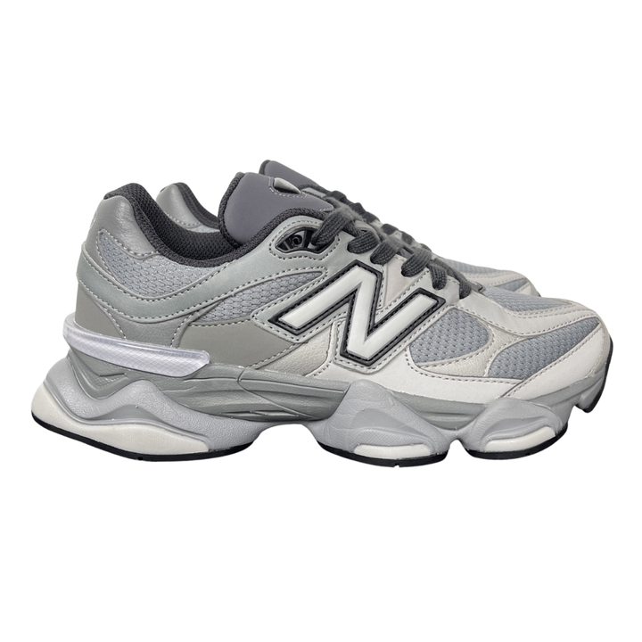 Shop New Balance 9060 U90609XS in Slate Grey and Harbor Grey with mesh and suede upper, ABZORB and SBS cushioning, CR heel device and sculpted Y2K styling.