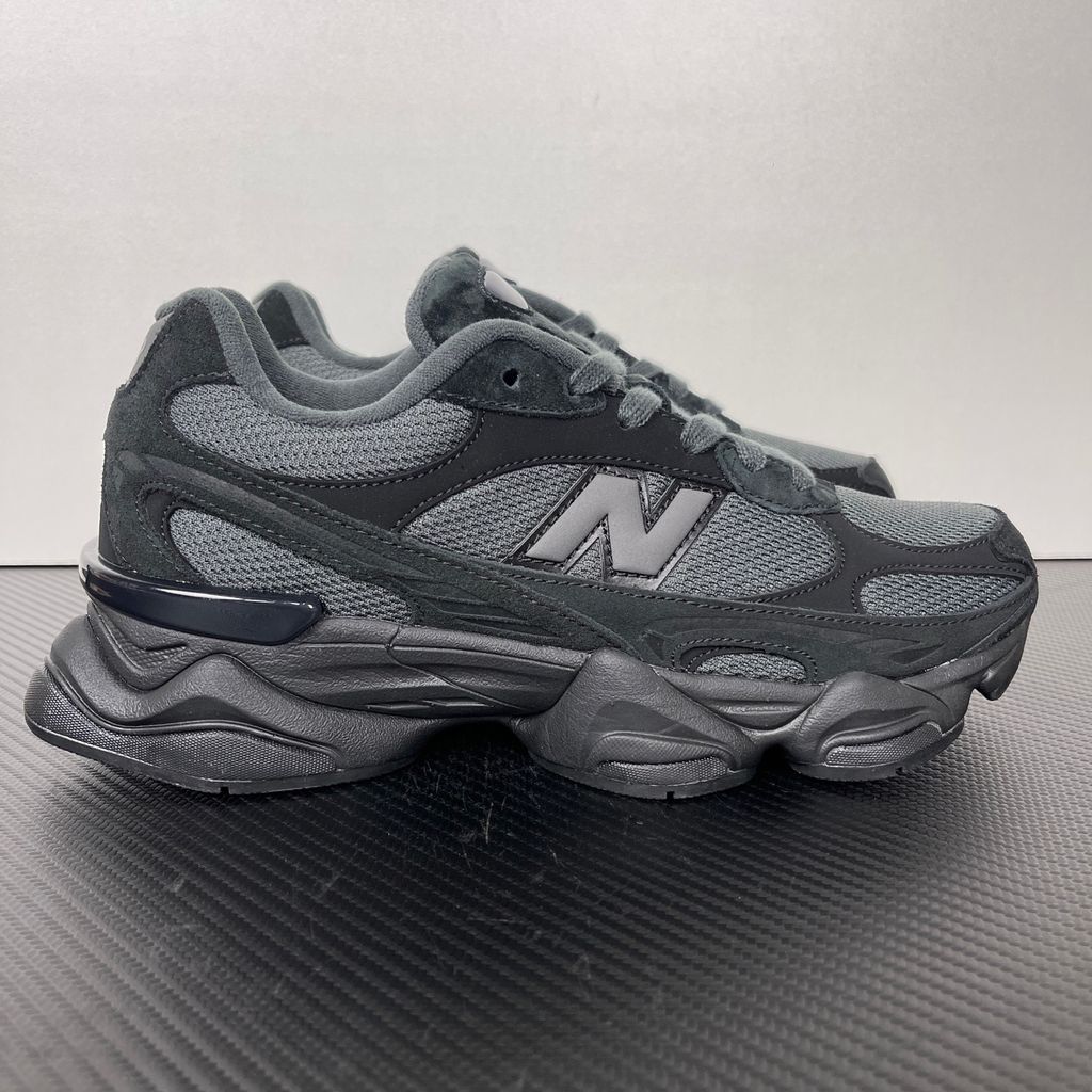 Shop New Balance 9060R U90604U4 in Black and Blacktop with suede and open mesh upper, ABZORB cushioning, split vamp overlays and extended mudguard.