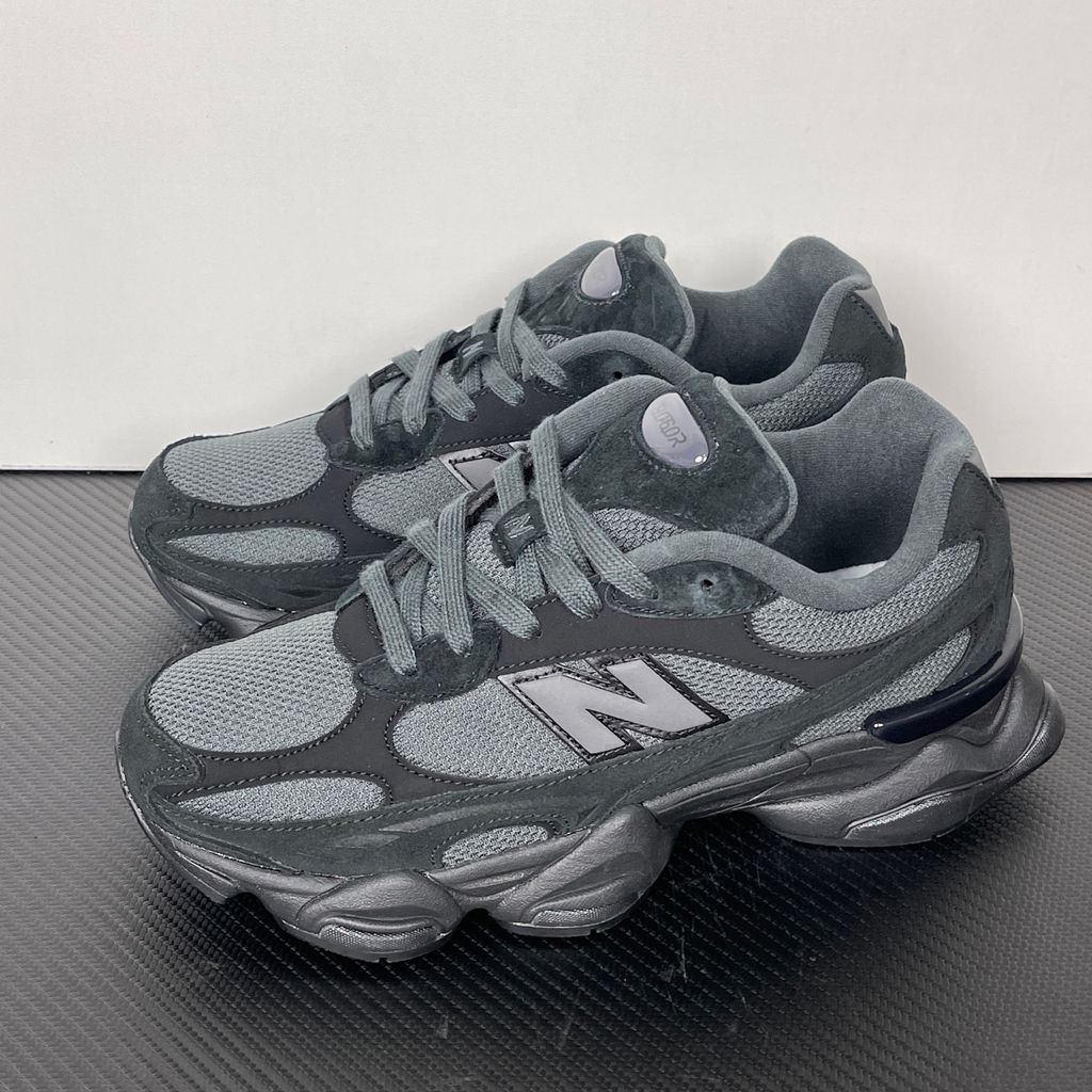 Shop New Balance 9060R U90604U4 in Black and Blacktop with suede and open mesh upper, ABZORB cushioning, split vamp overlays and extended mudguard.