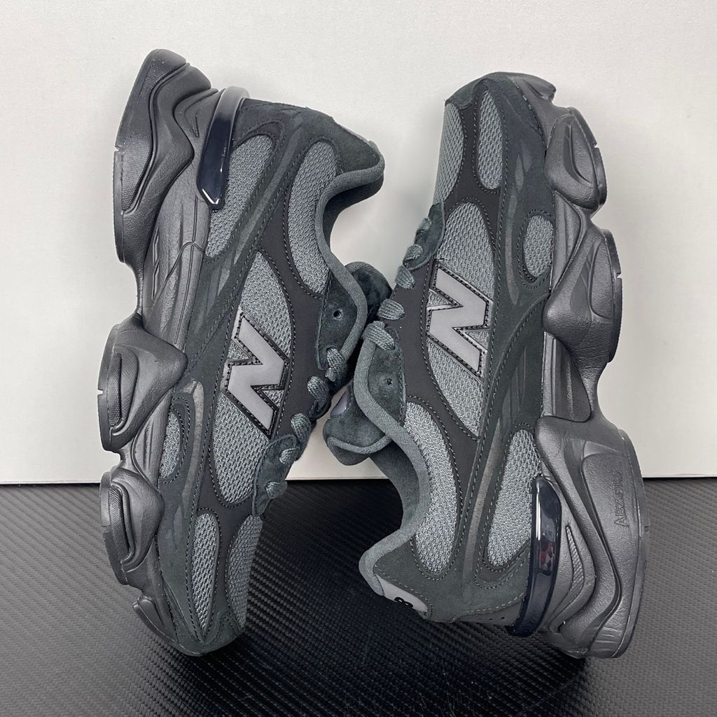 Shop New Balance 9060R U90604U4 in Black and Blacktop with suede and open mesh upper, ABZORB cushioning, split vamp overlays and extended mudguard.
