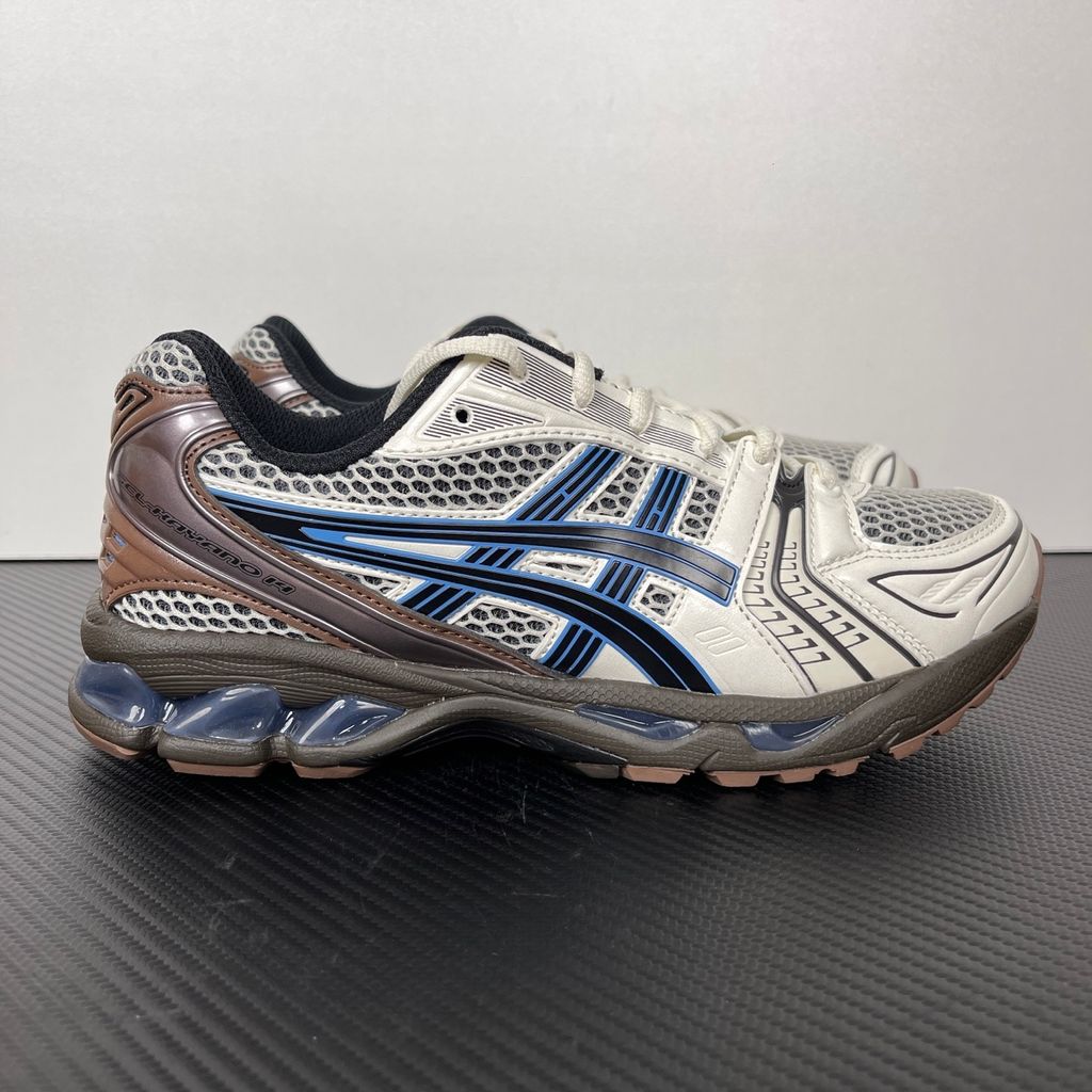 Shop ASICS GEL-KAYANO 14 1203A740-104 in Cream and Blue Coast with GEL cushioning, TRUSSTIC support and original-inspired 2008 tooling.