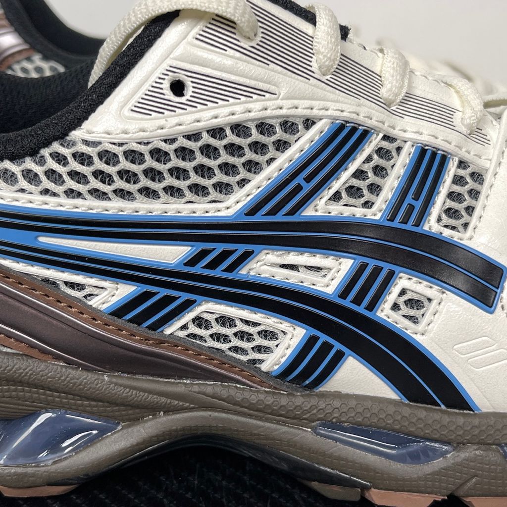 Shop ASICS GEL-KAYANO 14 1203A740-104 in Cream and Blue Coast with GEL cushioning, TRUSSTIC support and original-inspired 2008 tooling.